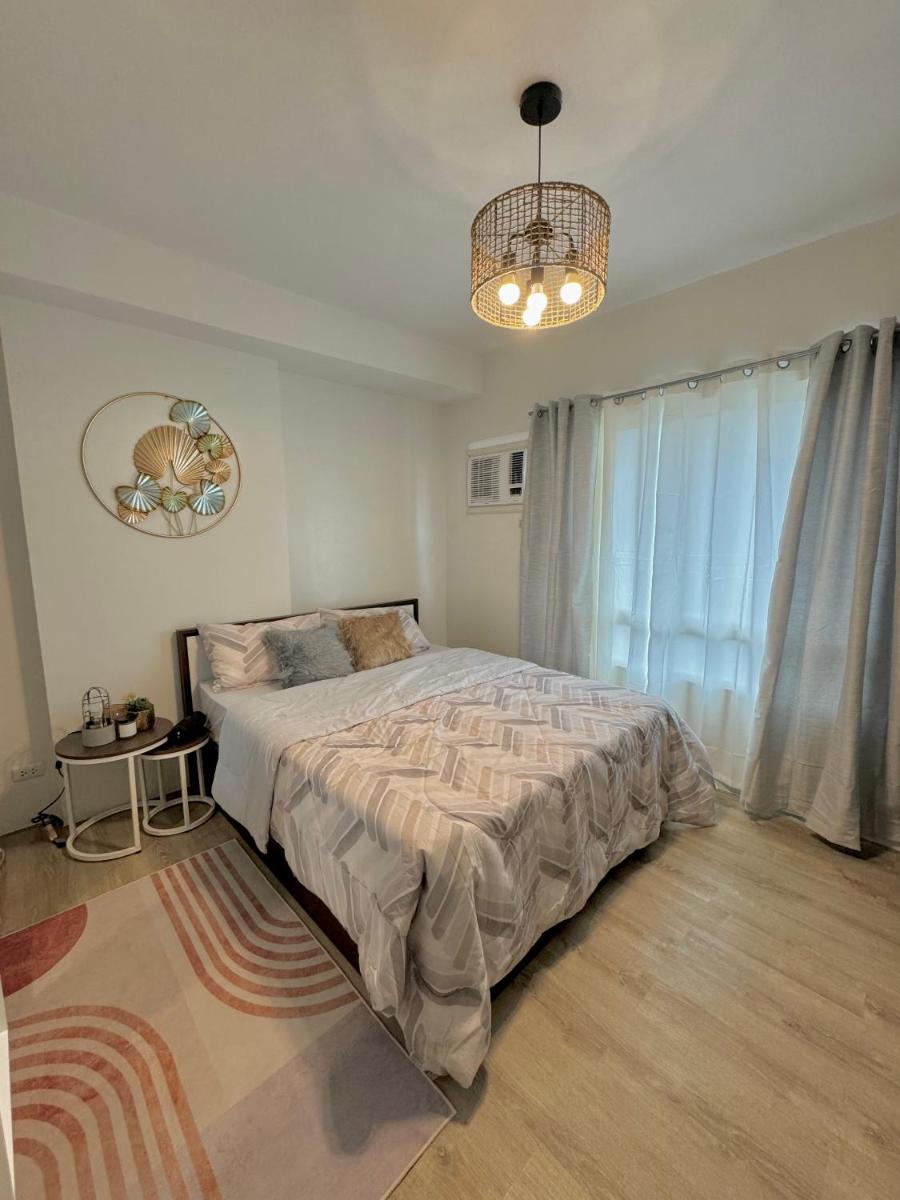 Cozy Loft at Mesavirre Garden Residences - Housity