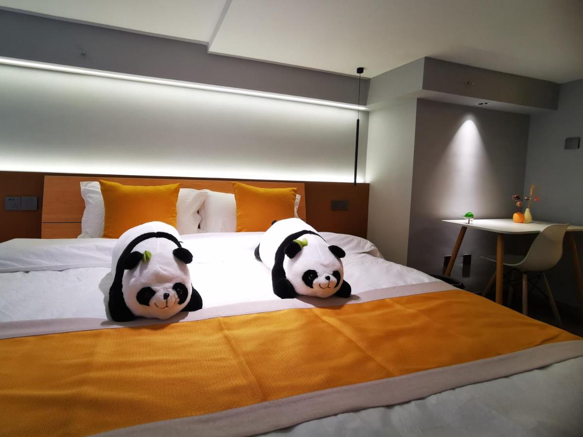 Panda ZuoKe Besucher Apartment 熊猫坐客民宿 - Hizvo