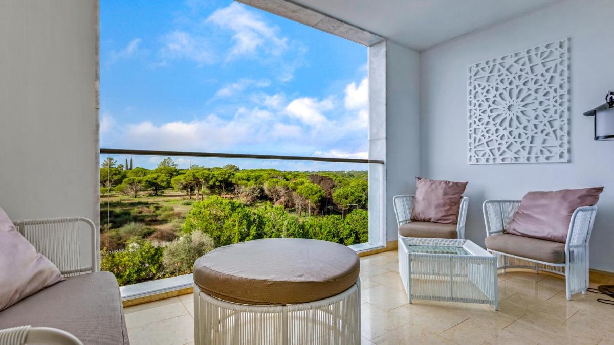 Uma área de estar em Conrad Algarve