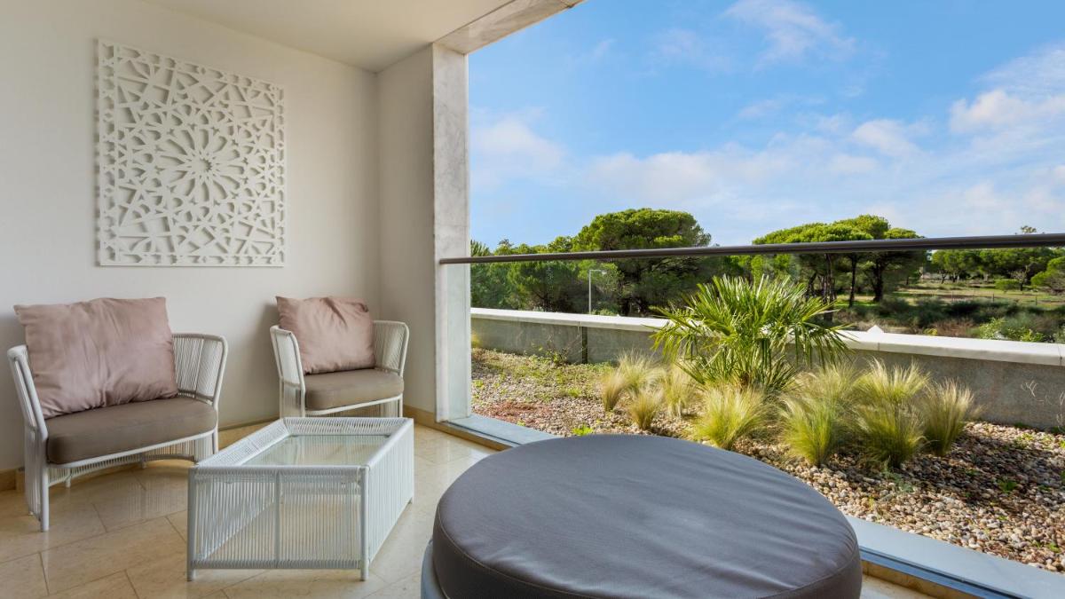 Uma varanda ou terraço em Conrad Algarve