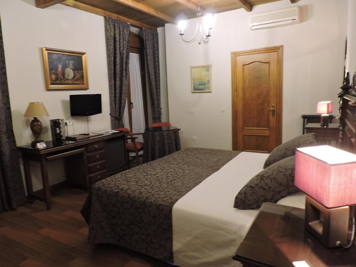 Cama o camas de una habitación en Hotel Palacio de Oñate