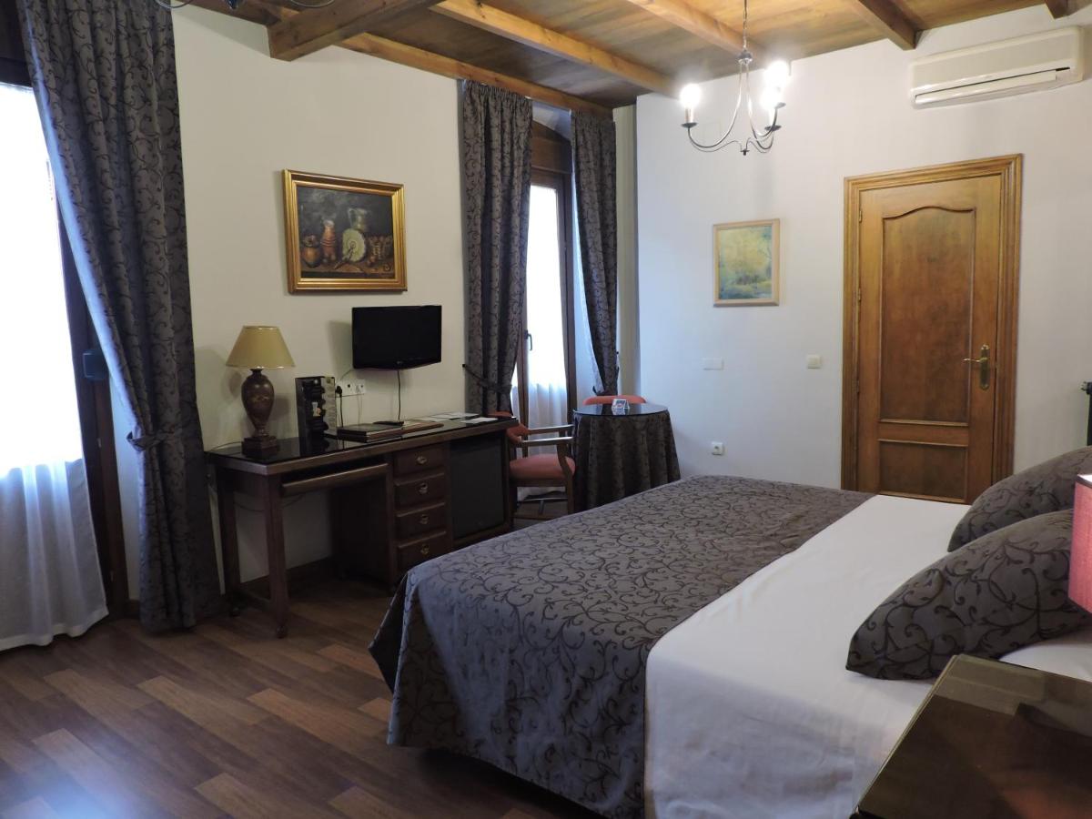 Cama o camas de una habitación en Hotel Palacio de Oñate