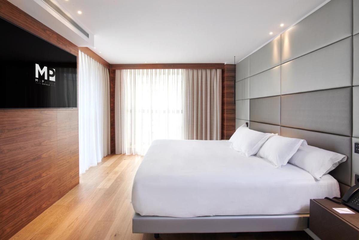 Cama o camas de una habitación en Hotel MyPalace León