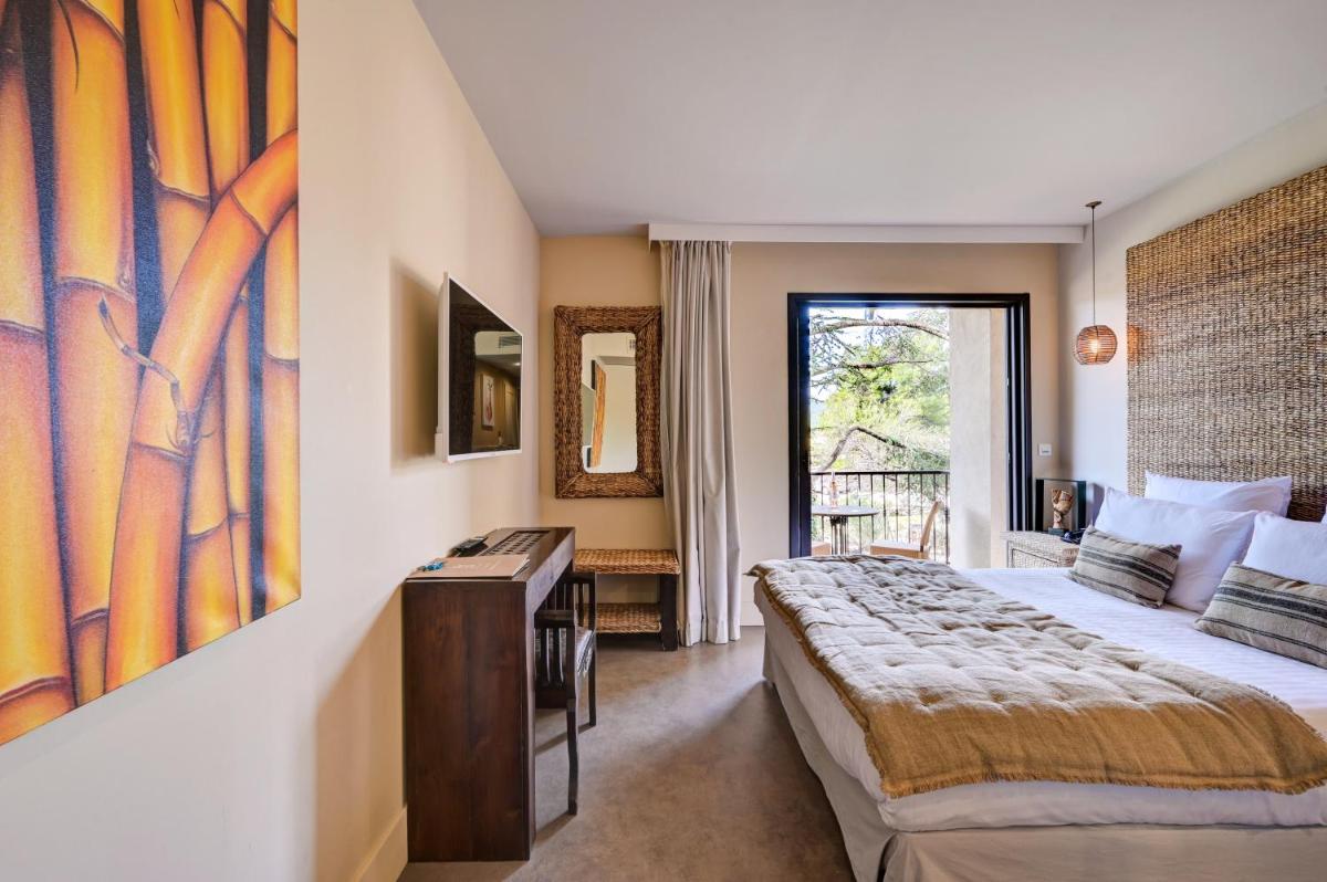 Un ou plusieurs lits dans un hébergement de l'établissement Hotel Bastide & SPA - Villa de Lourmarin
