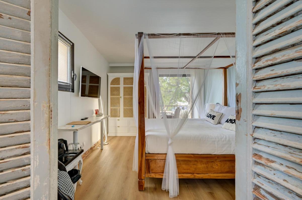 Un ou plusieurs lits dans un hébergement de l'établissement Hotel Bastide & SPA - Villa de Lourmarin