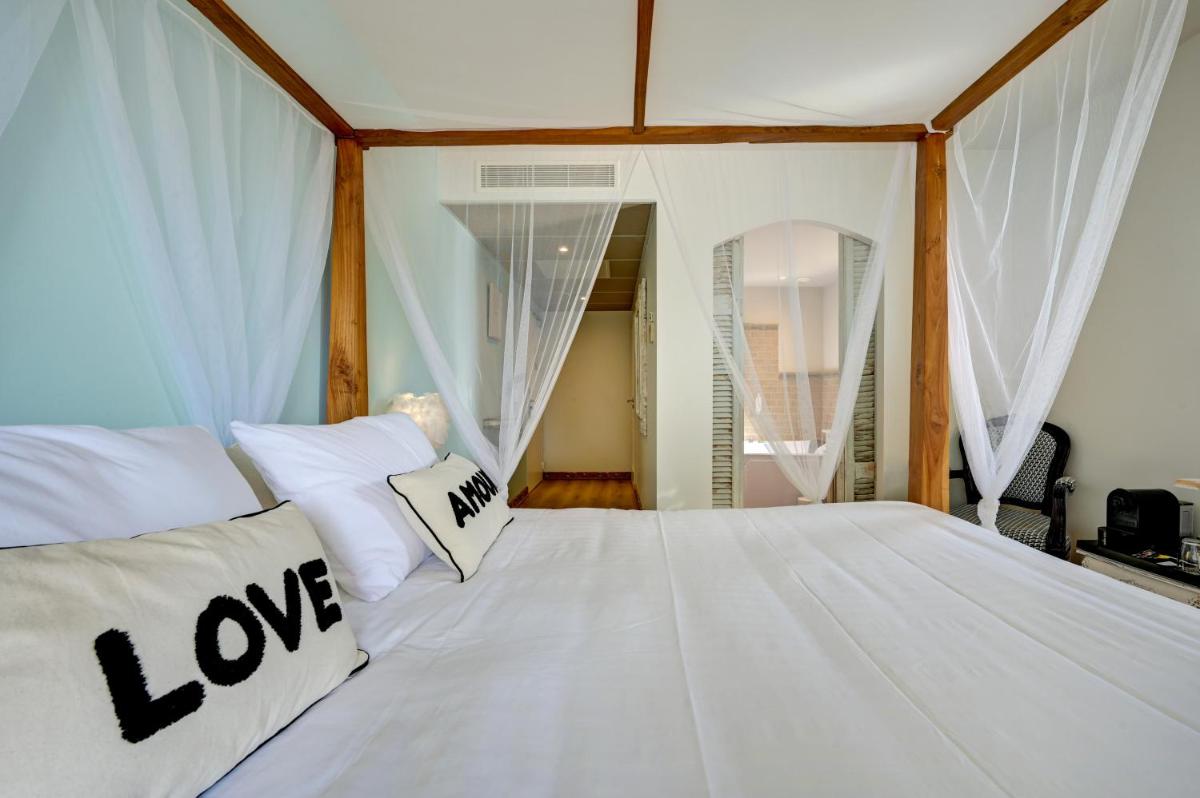 Un ou plusieurs lits dans un hébergement de l'établissement Hotel Bastide & SPA - Villa de Lourmarin
