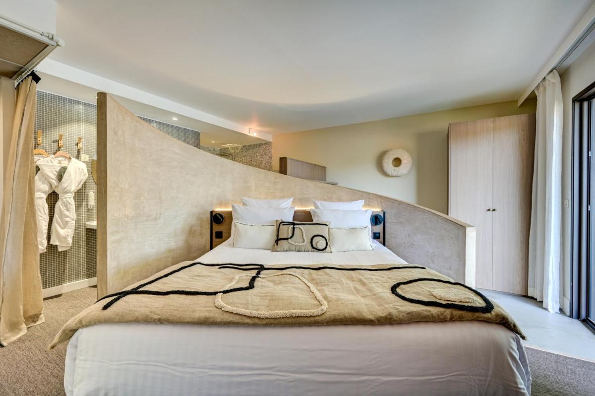 Un ou plusieurs lits dans un hébergement de l'établissement Hotel Bastide & SPA - Villa de Lourmarin