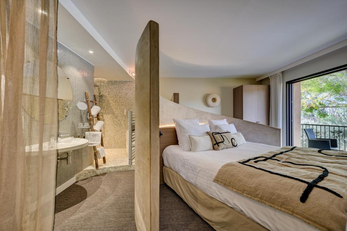 Un ou plusieurs lits dans un hébergement de l'établissement Hotel Bastide & SPA - Villa de Lourmarin