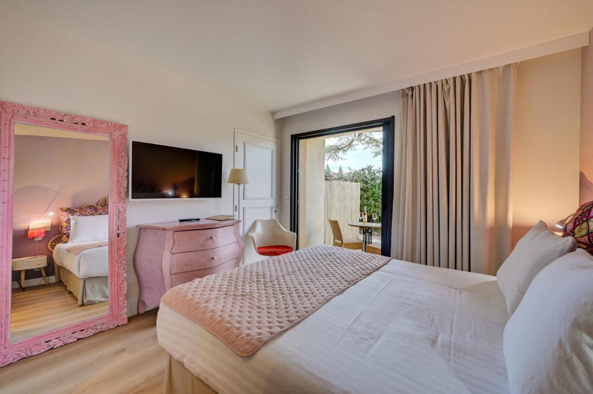 Un ou plusieurs lits dans un hébergement de l'établissement Hotel Bastide & SPA - Villa de Lourmarin