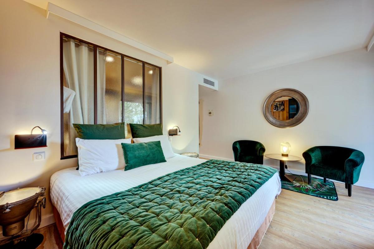 Un ou plusieurs lits dans un hébergement de l'établissement Hotel Bastide & SPA - Villa de Lourmarin