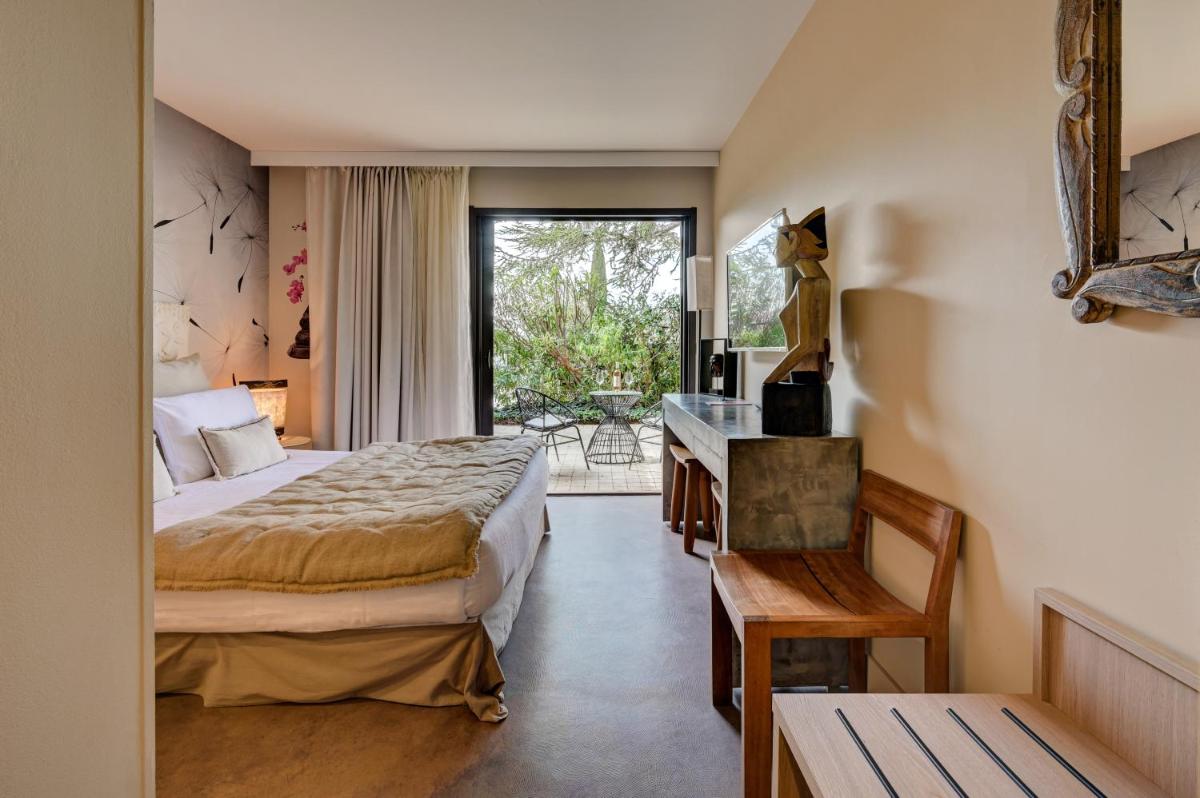 Un ou plusieurs lits dans un hébergement de l'établissement Hotel Bastide & SPA - Villa de Lourmarin