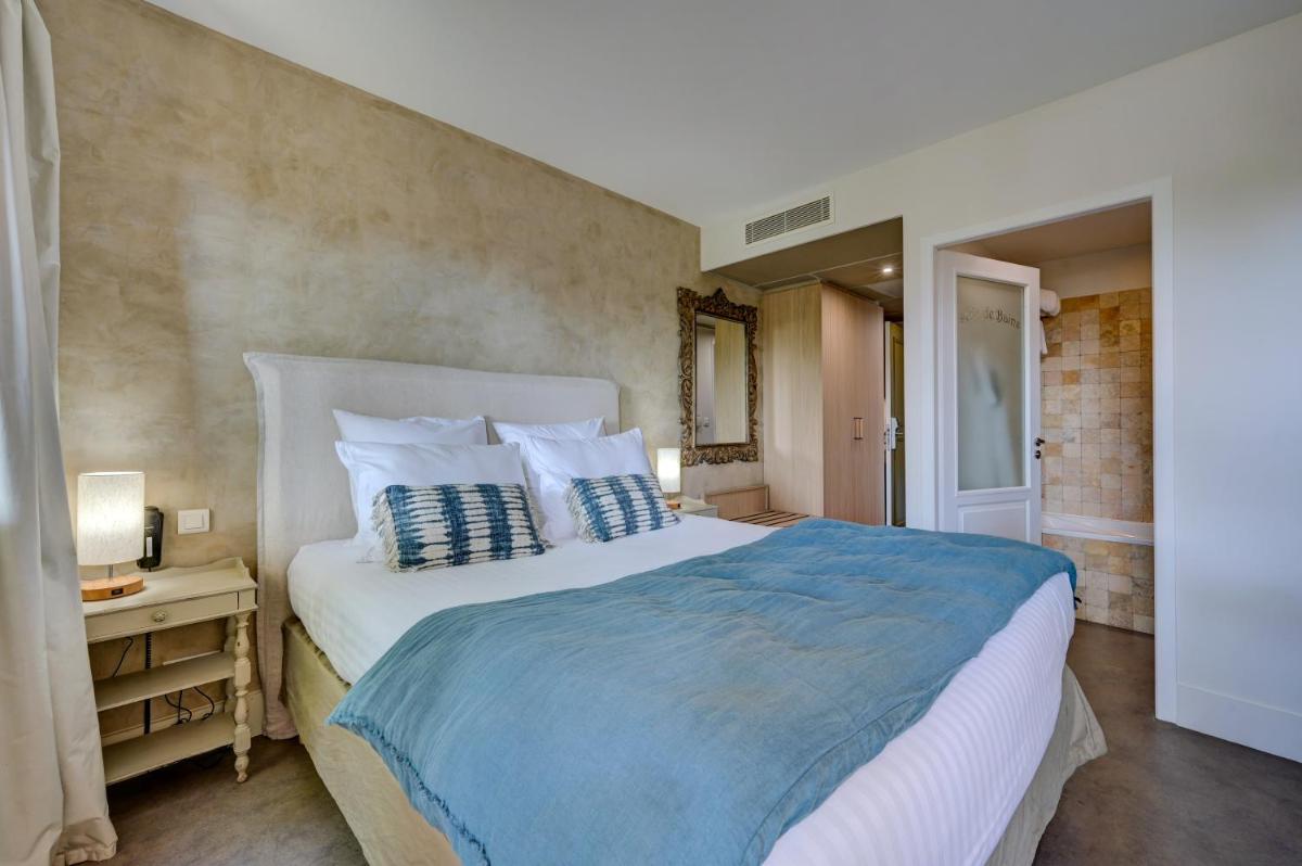Un ou plusieurs lits dans un hébergement de l'établissement Hotel Bastide & SPA - Villa de Lourmarin