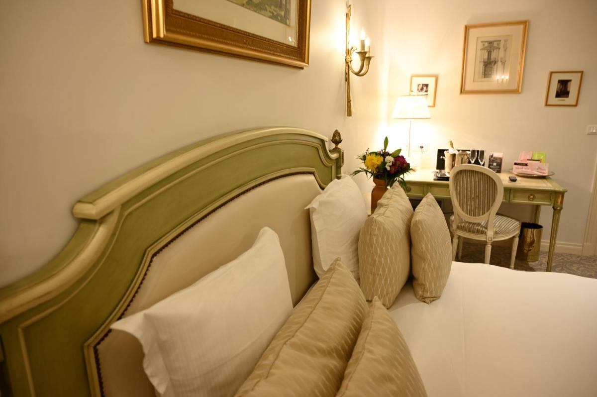 Coin salon dans l'établissement Hôtel La Villa Eugene