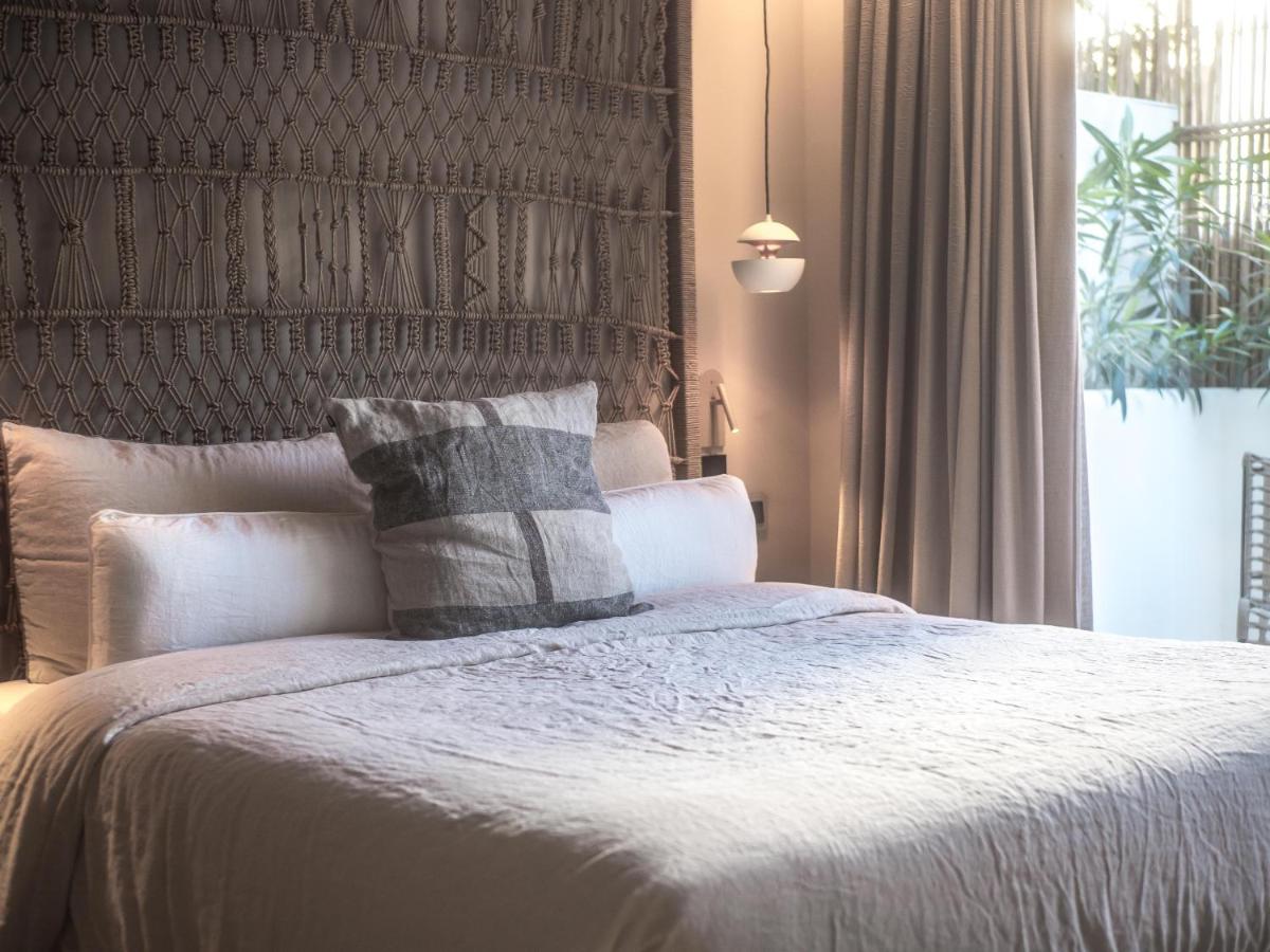 Cama o camas de una habitación en Barefoot Hotel Mallorca