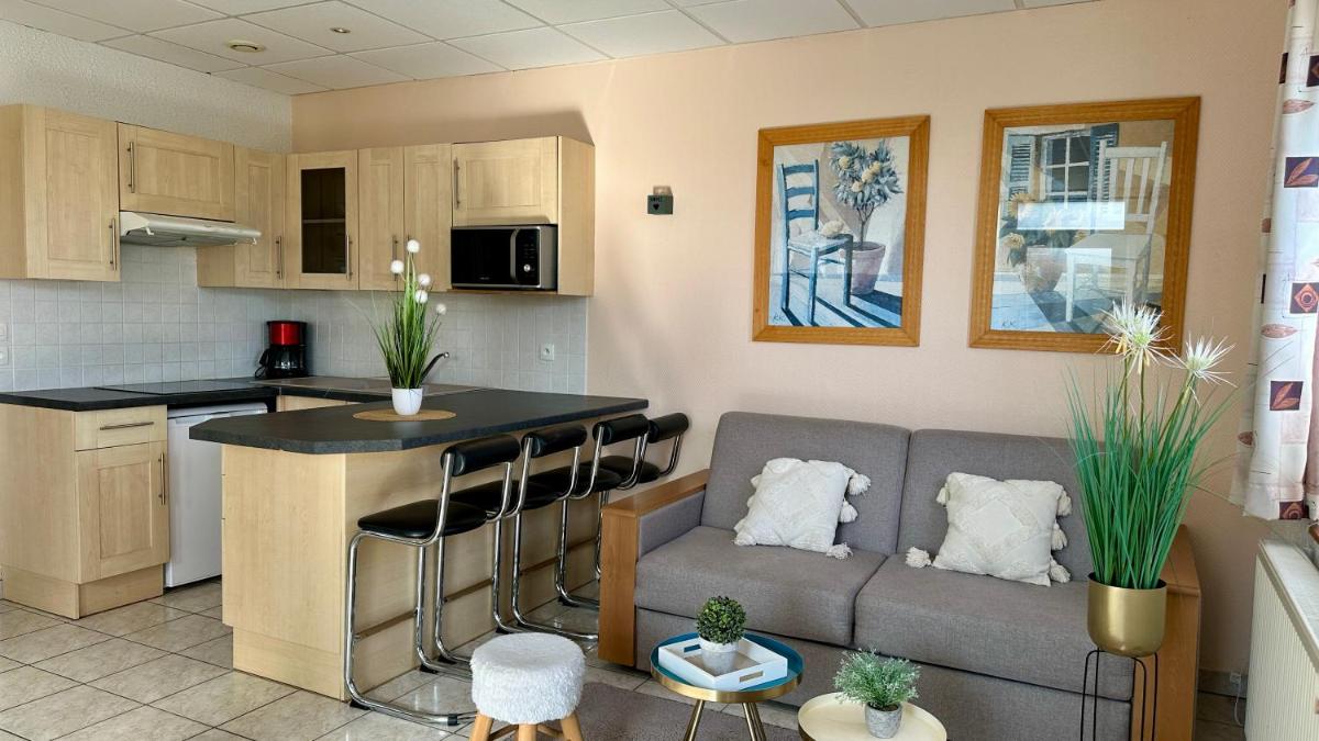 Cuisine ou kitchenette dans l'établissement La Maison Blanche
