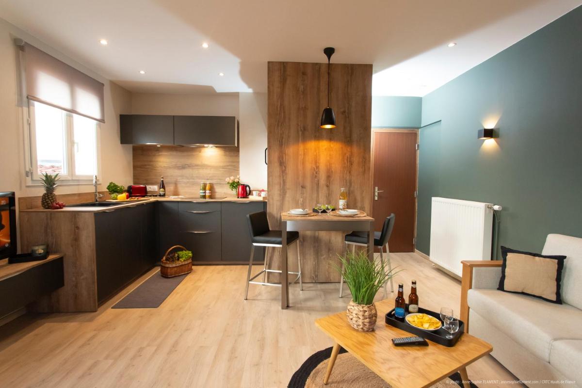 Cuisine ou kitchenette dans l'établissement La Maison Blanche