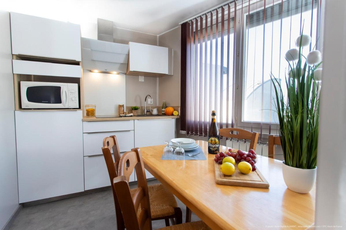 Cuisine ou kitchenette dans l'établissement La Maison Blanche
