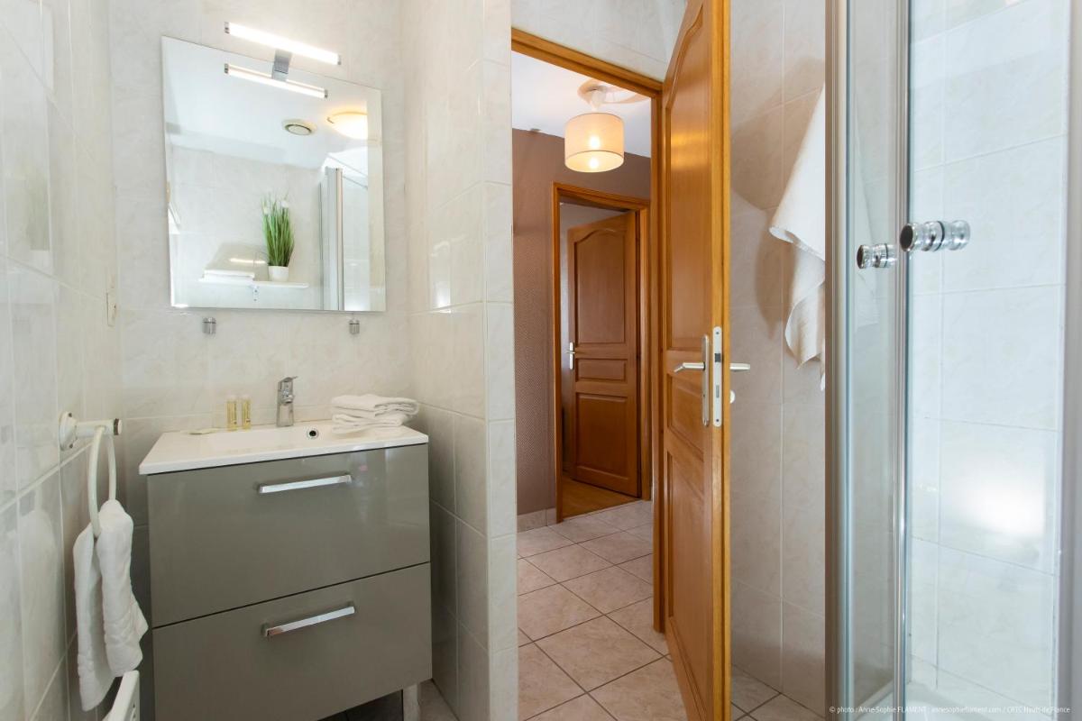 Salle de bains dans l'établissement La Maison Blanche