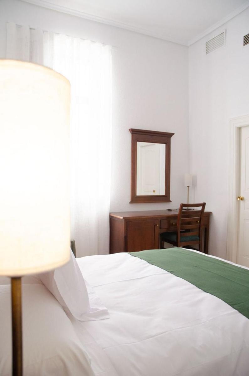Cama o camas de una habitación en Hotel Balneario de Marmolejo