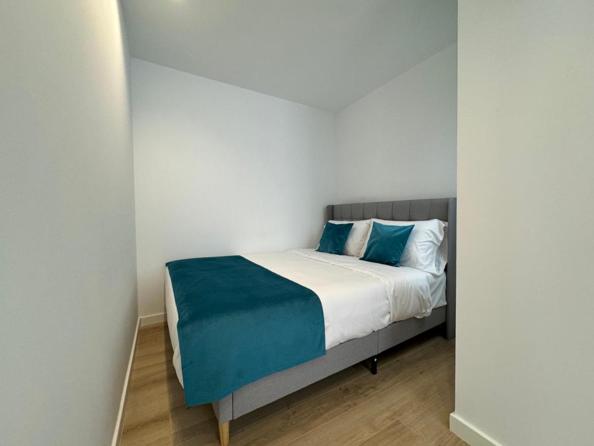Cama o camas de una habitación en Apart-hotel Happy Life