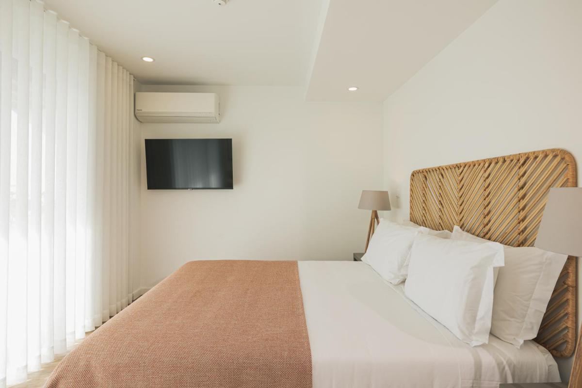 Uma cama ou camas num quarto em Alto do Forte