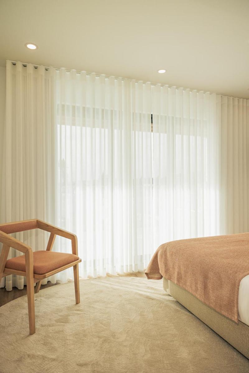 Uma cama ou camas num quarto em Alto do Forte