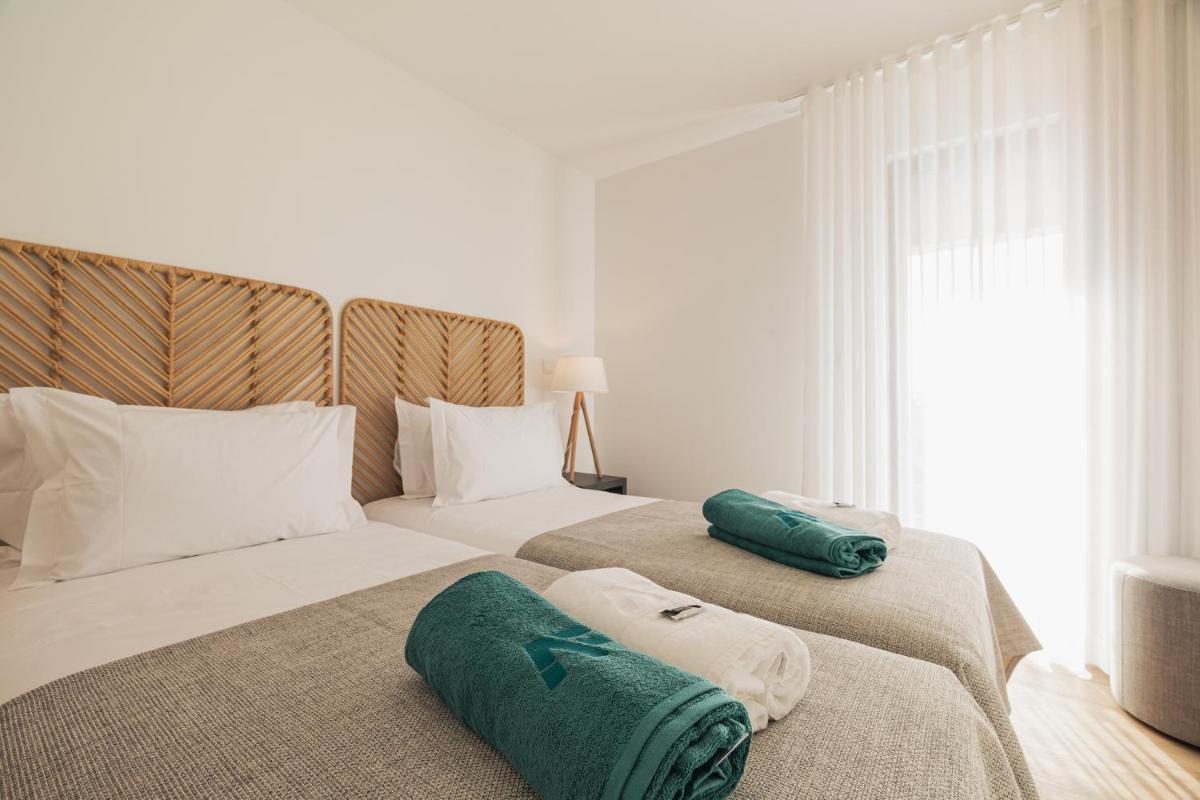 Uma cama ou camas num quarto em Alto do Forte
