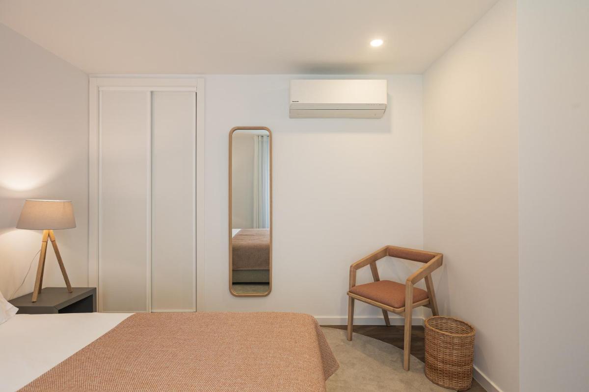 Uma cama ou camas num quarto em Alto do Forte