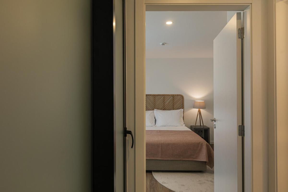 Uma cama ou camas num quarto em Alto do Forte