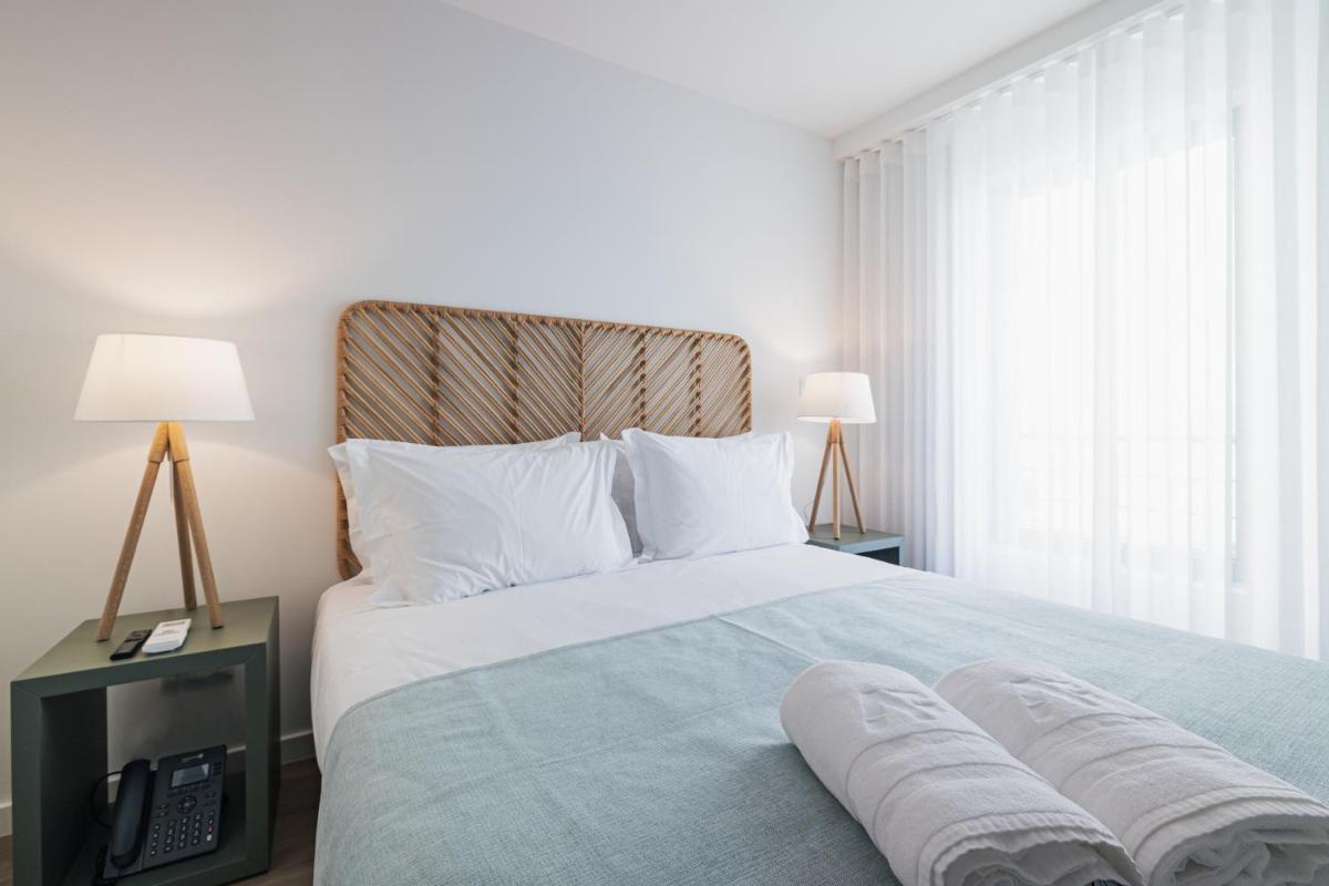 Uma cama ou camas num quarto em Alto do Forte