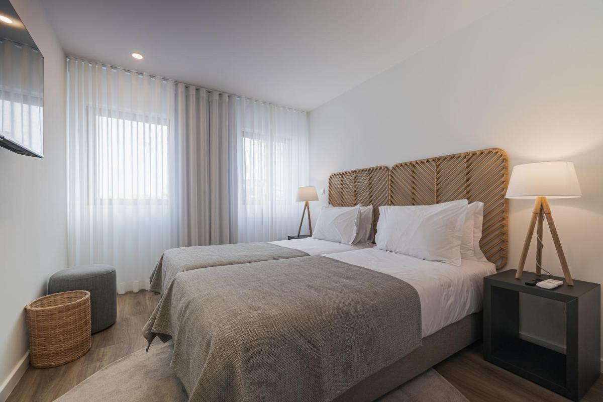 Uma cama ou camas num quarto em Alto do Forte