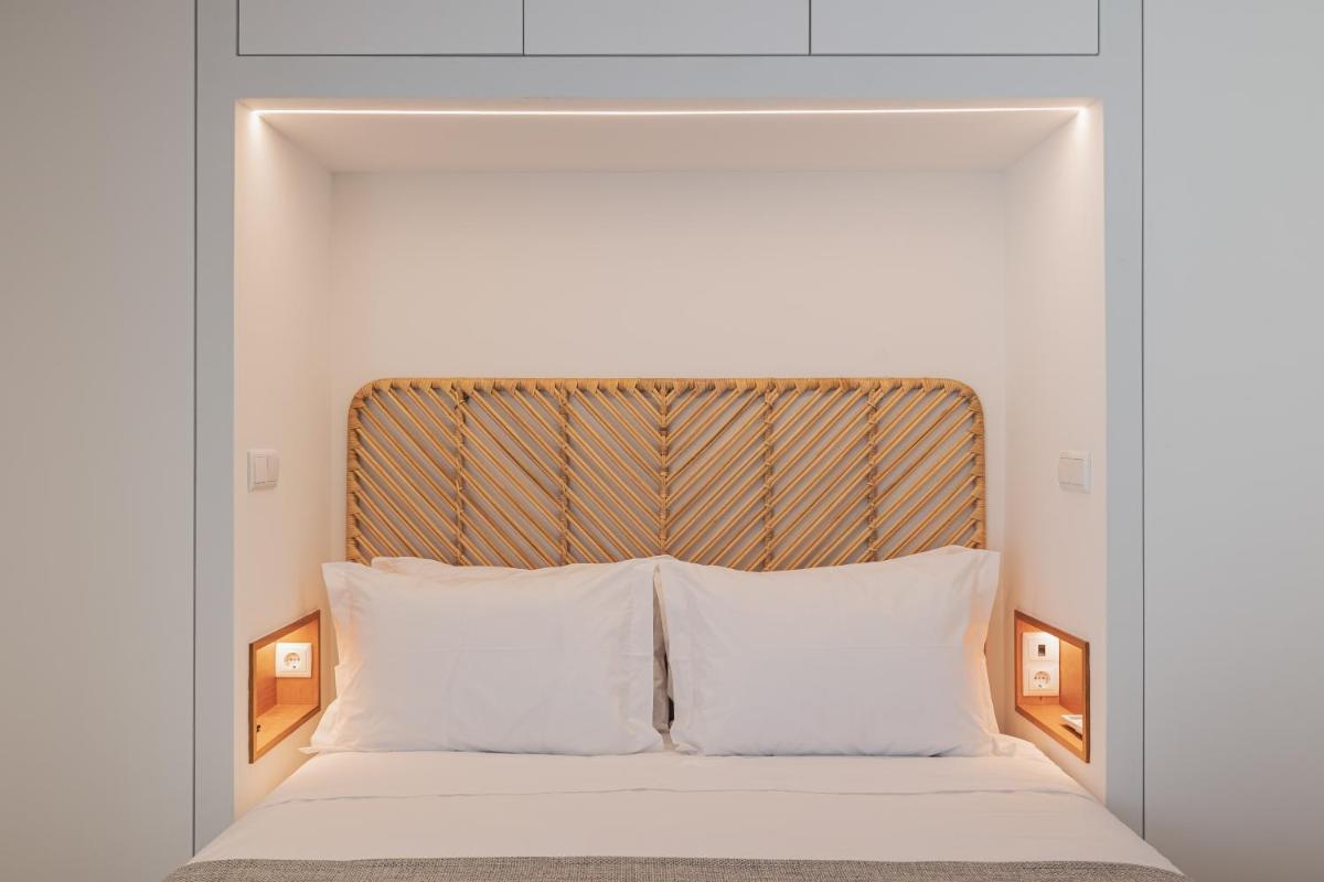 Uma cama ou camas num quarto em Alto do Forte