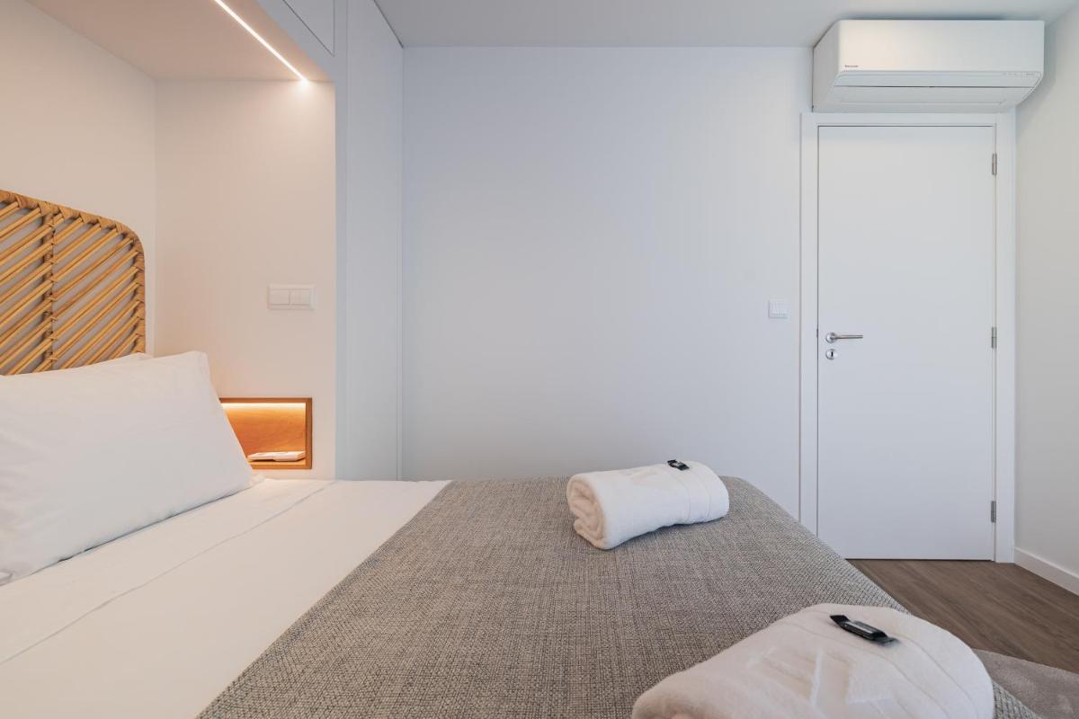 Uma cama ou camas num quarto em Alto do Forte