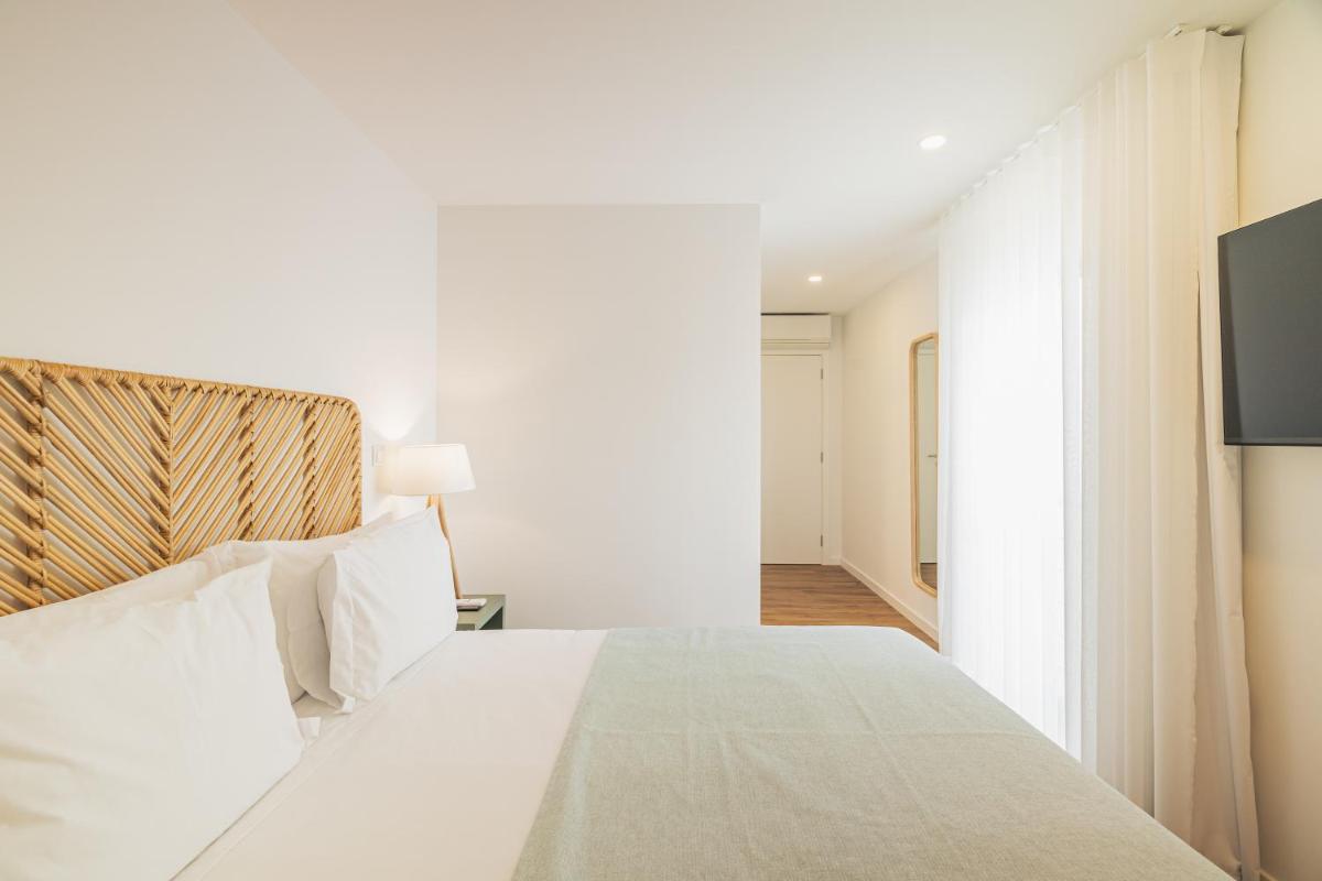 Uma cama ou camas num quarto em Alto do Forte