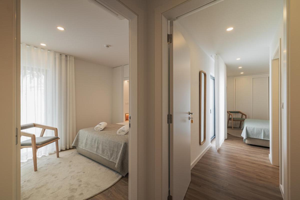 Uma cama ou camas num quarto em Alto do Forte