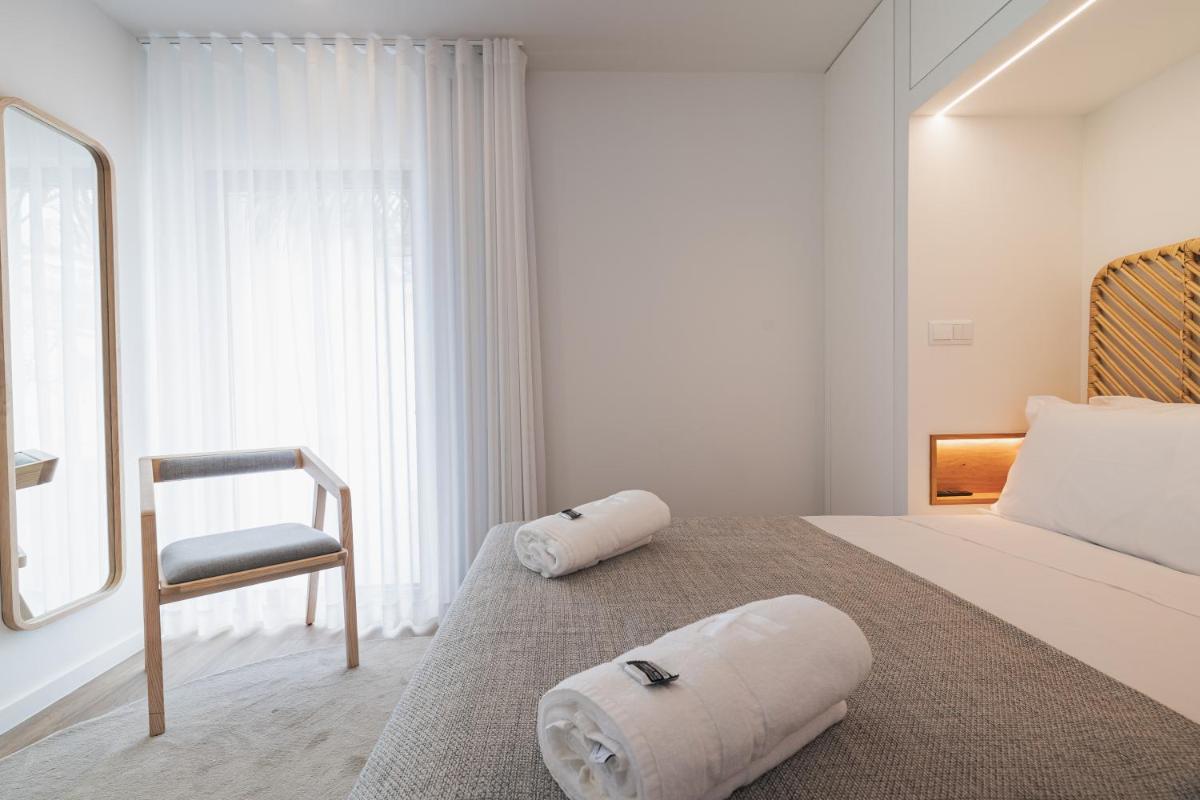 Uma cama ou camas num quarto em Alto do Forte
