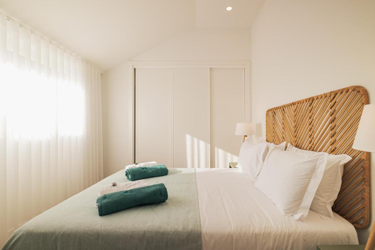 Uma cama ou camas num quarto em Alto do Forte