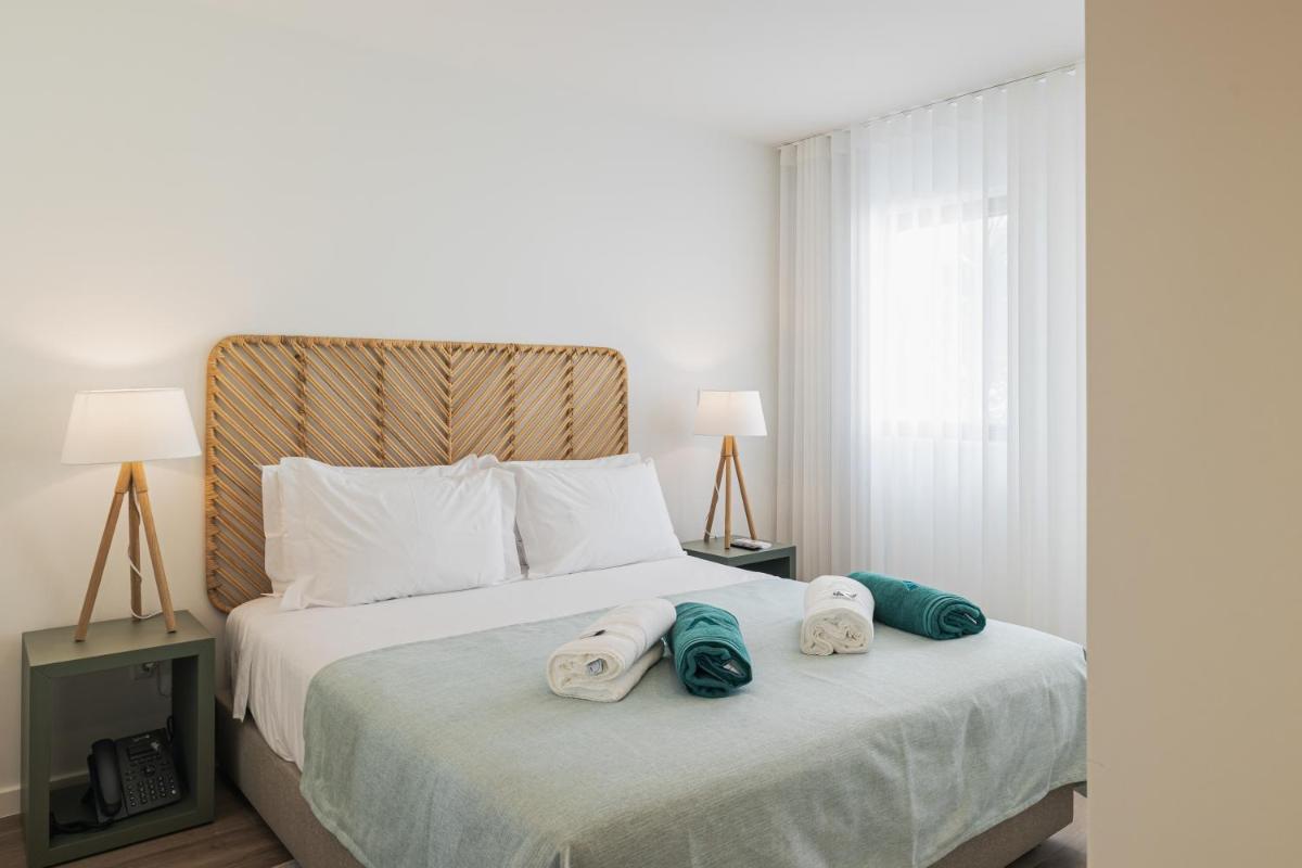 Uma cama ou camas num quarto em Alto do Forte