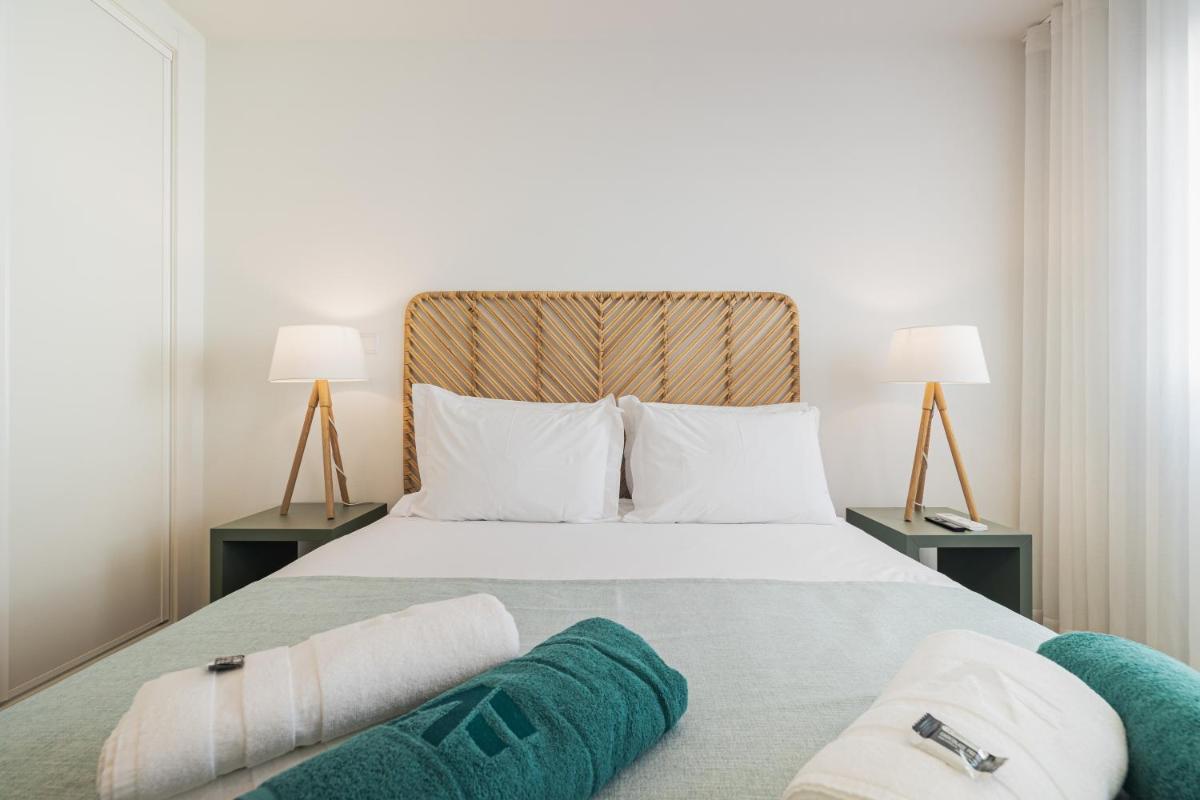Uma cama ou camas num quarto em Alto do Forte