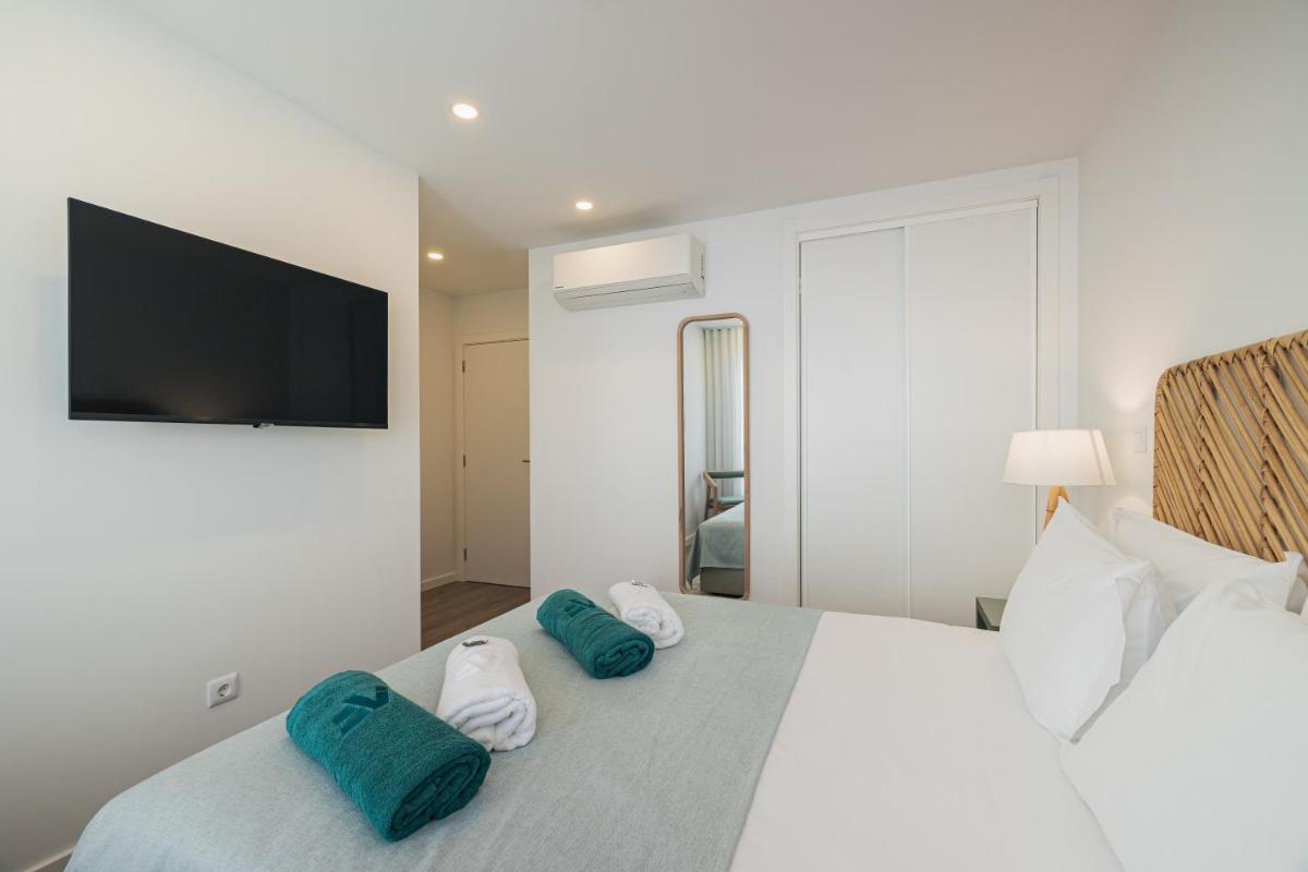 Uma cama ou camas num quarto em Alto do Forte