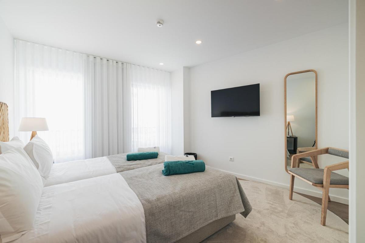 Uma cama ou camas num quarto em Alto do Forte