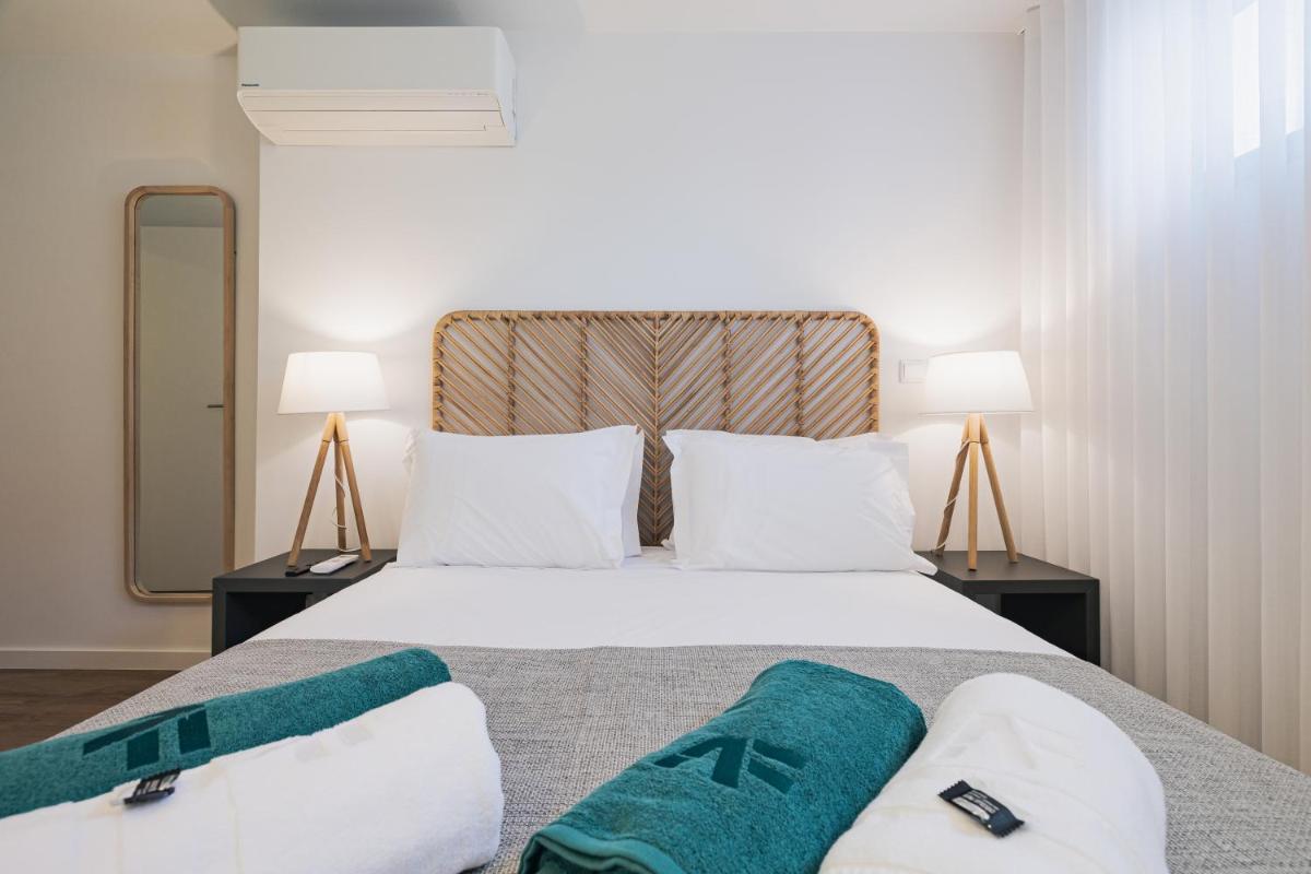 Uma cama ou camas num quarto em Alto do Forte