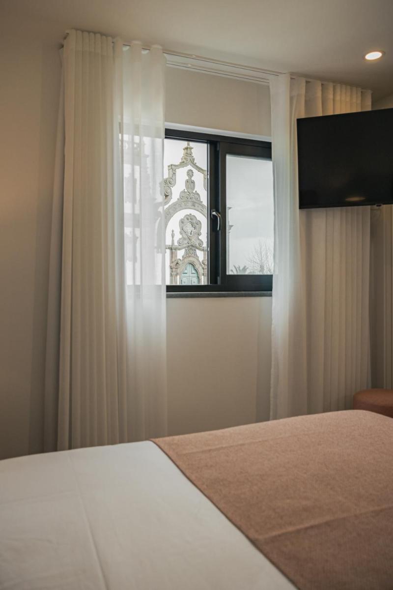 Uma cama ou camas num quarto em Alto do Forte