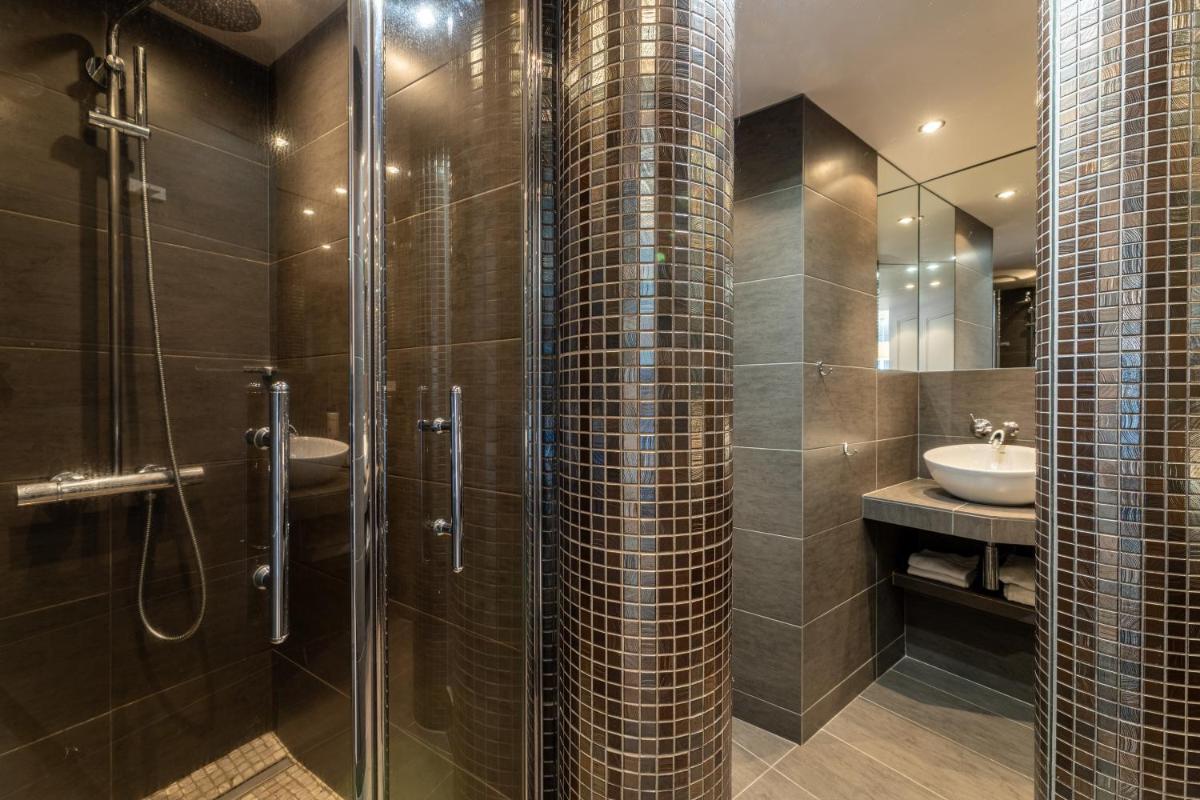 Salle de bains dans l'établissement Le Bailliage Hôtel & Spa