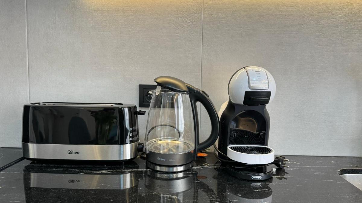 Utensilios para hacer té y café en Apart-hotel Happy Life