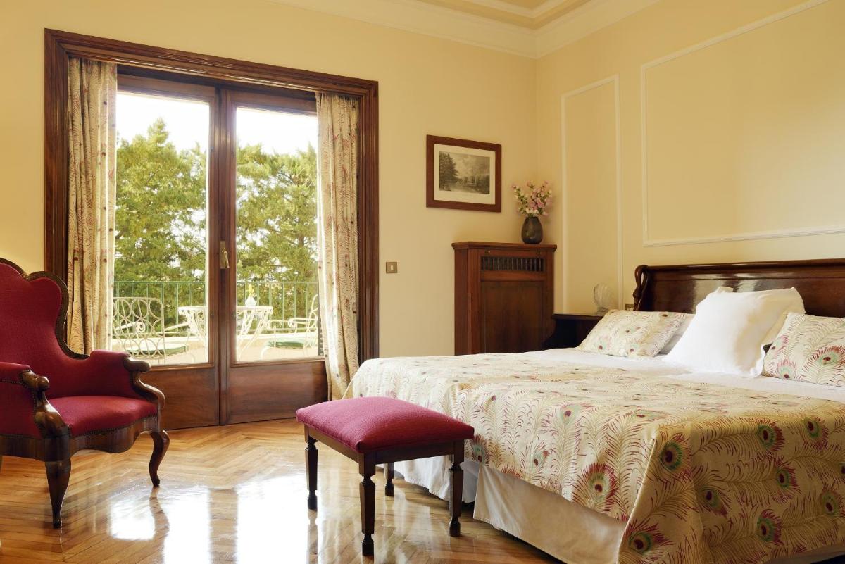 Cama o camas de una habitación en Hostal de la Gavina GL - The Leading Hotels of the World