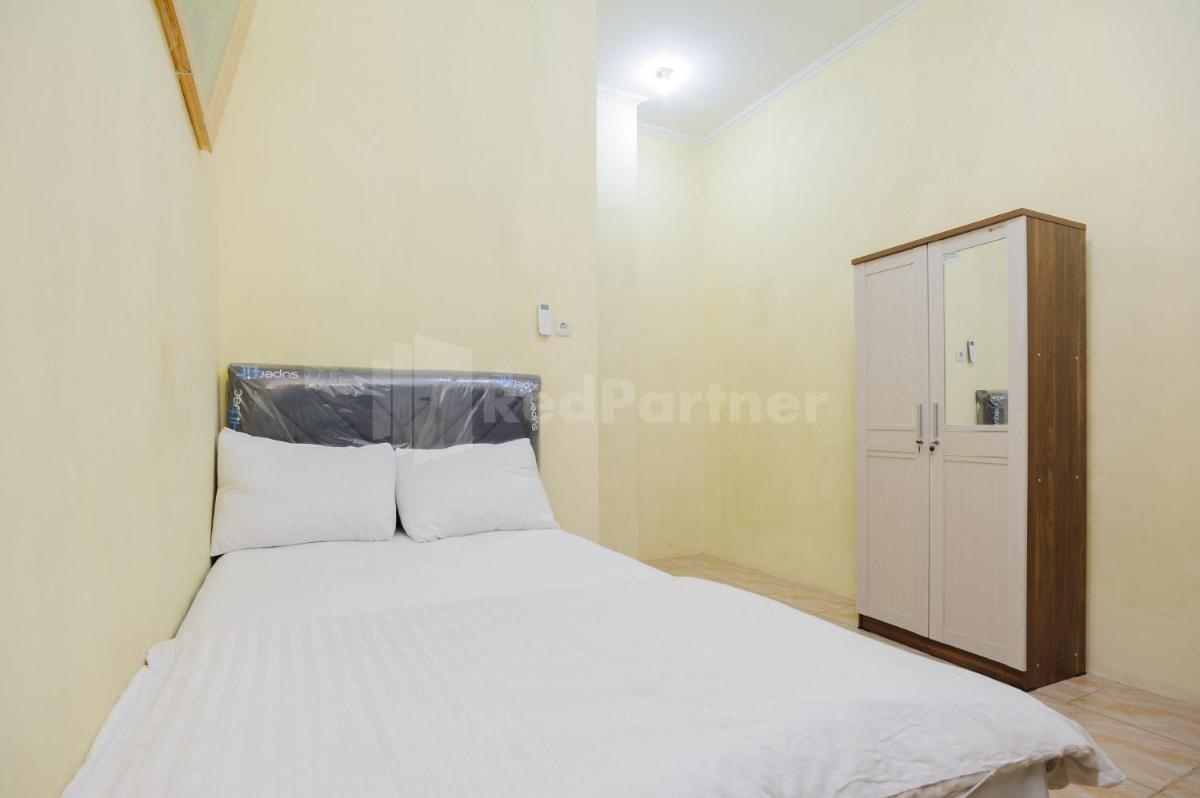 Suitetrails - Fajar Inn Mitra RedDoorz