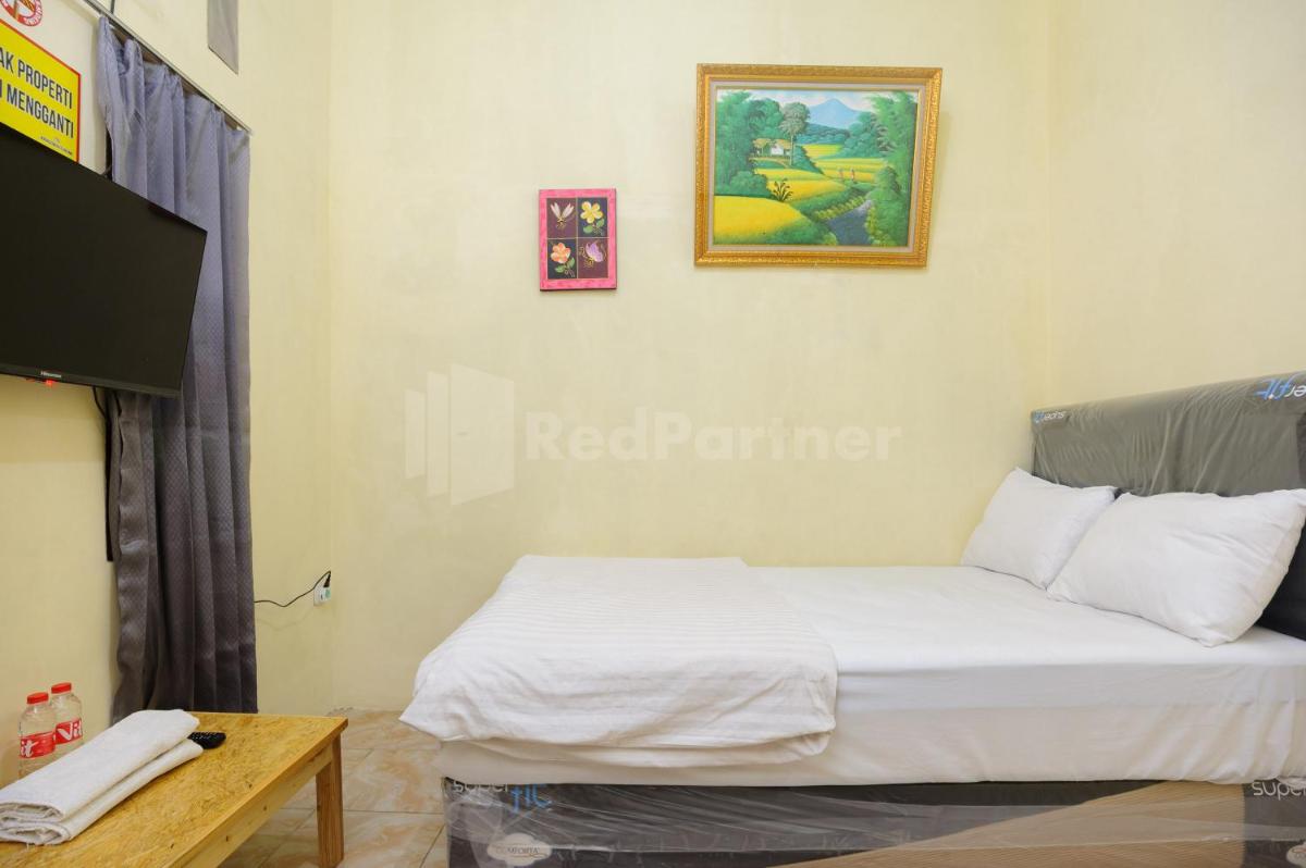 Suitetrails - Fajar Inn Mitra RedDoorz