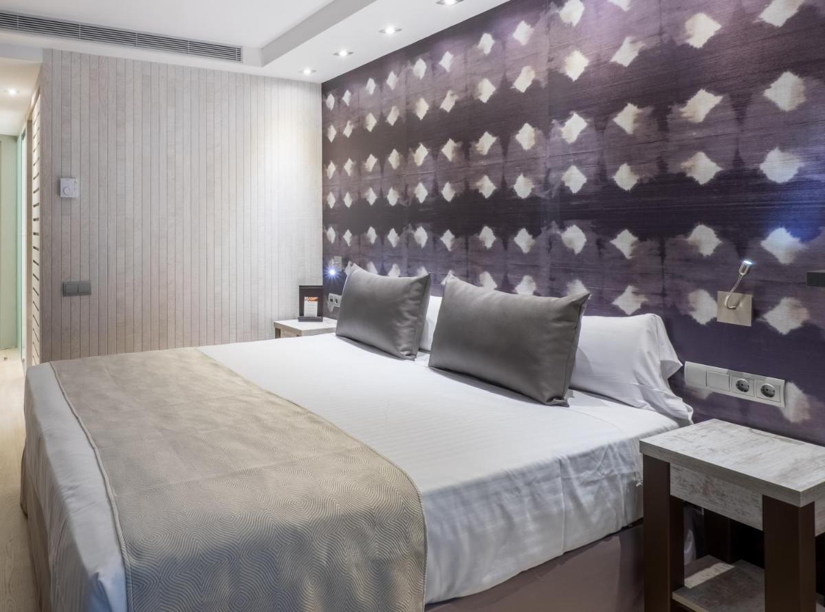 Cama o camas de una habitación en Catalonia Atenas