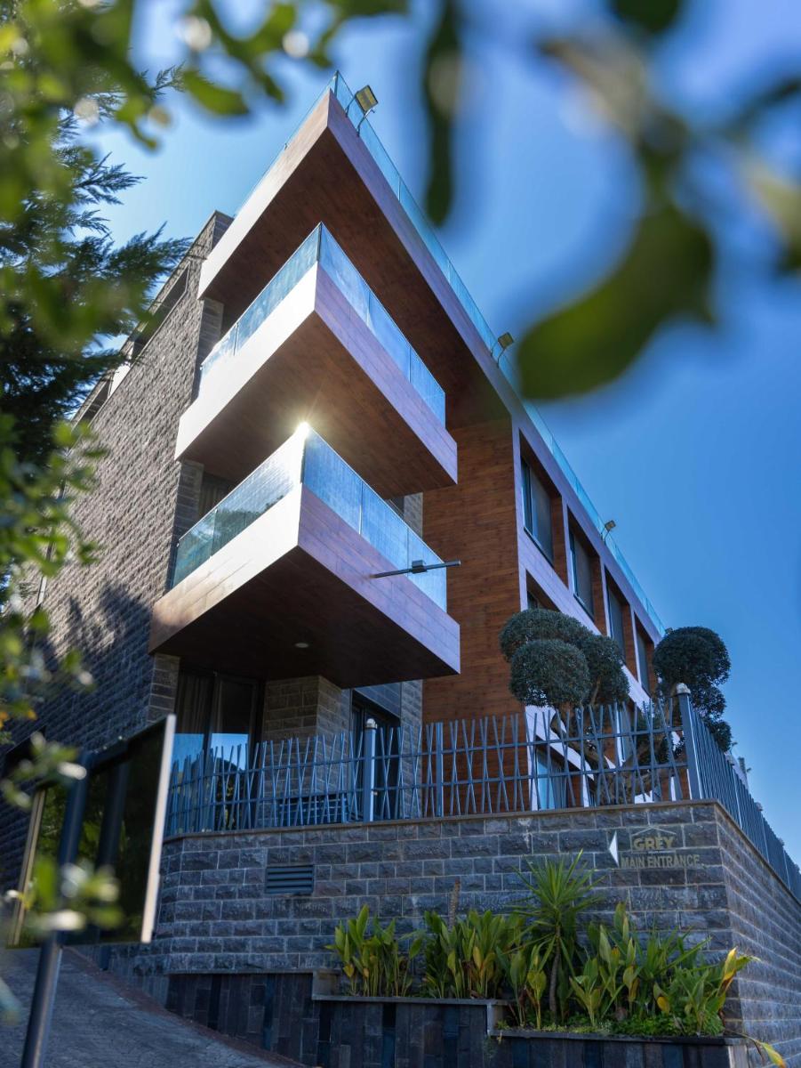 Grey escape apartments - Housity
